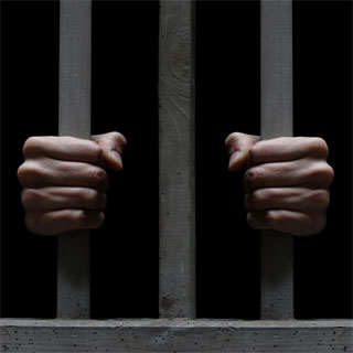 Prisoner and bars