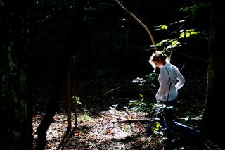 Woman in the woods copyright erie chapman 2010