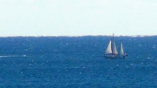 Distant sailboat