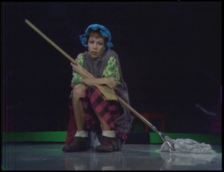 Carol burnett with mop and pail